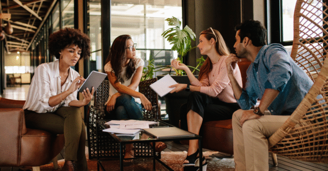 A team sitting and strategesing