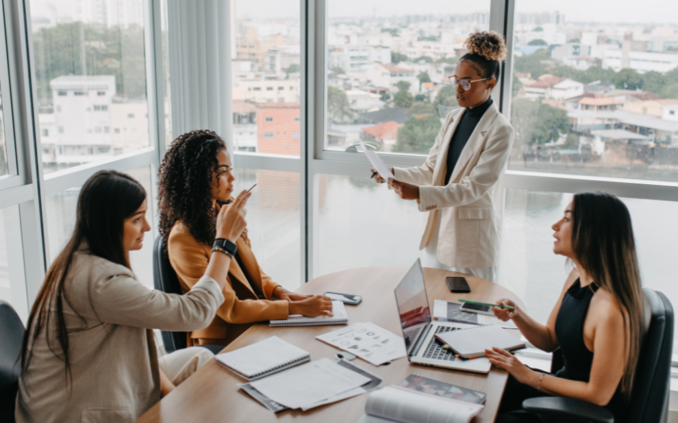 Blog Covers (20) Woman sitting thoughtfully while engaging with Change Leadership concepts in a calm workspace.